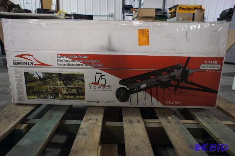 New in box Brinly Pull-behind Lawn Dethatcher...