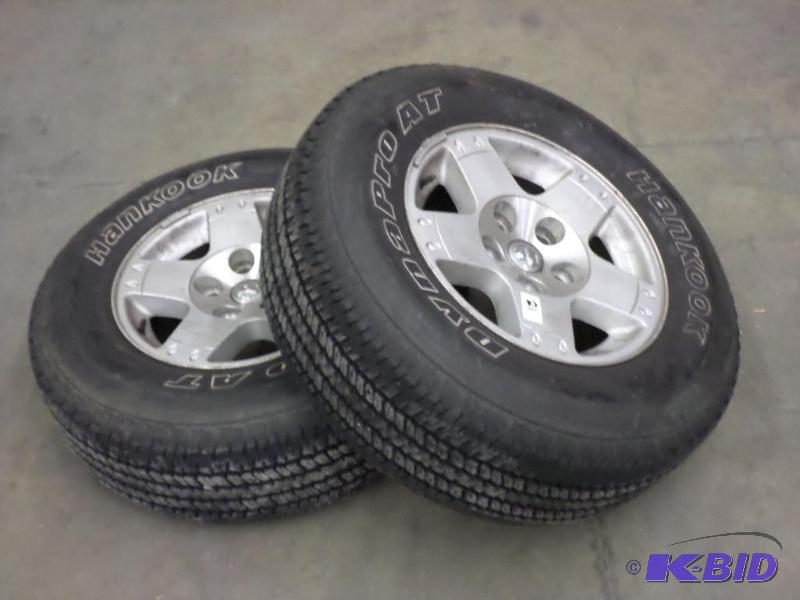 lot 21 image: (2) Dodge 5-Lug Wheels With Hankook Dynapro A...