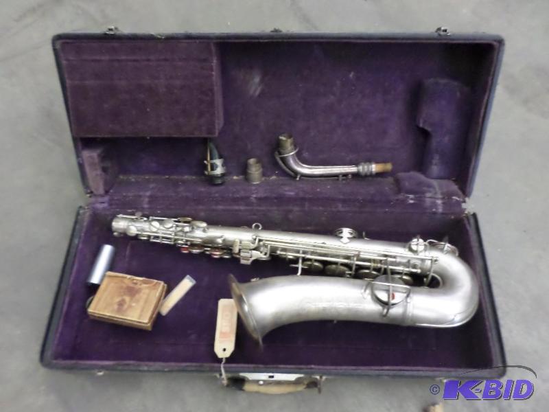 lot 48 image: C.G. Conn Saxaphone With Case...