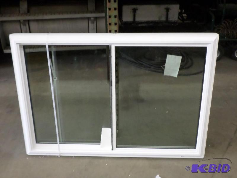 lot 62 image: Unused White Vinyl Double Hung 56&quotx37.5&...