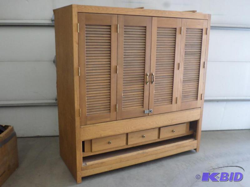 lot 69 image: Large Rolling Wooden Cabinet With Double Bi-F...