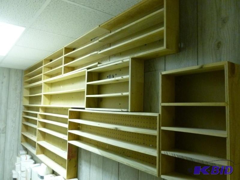 lot 28 image: Large wooden paint container wall rack, has a...