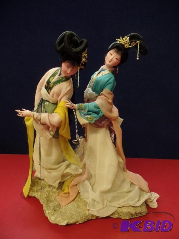 2 Traditional Asian Figurines on a Stone Base