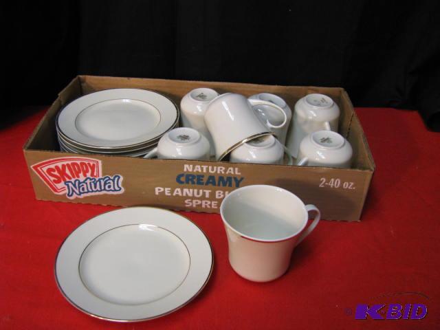 eight coffee cups and matching dessert plates...