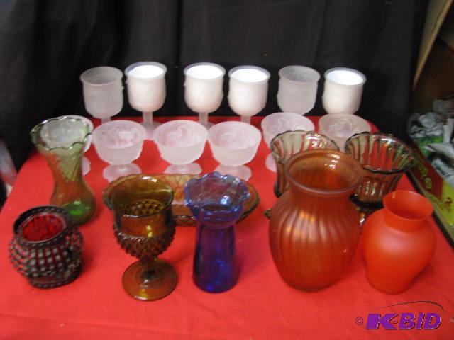 assorted glassware, some colored some frosted...