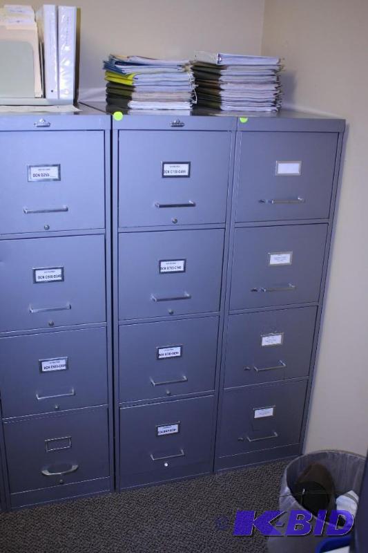 lot 103 image: Lot of (3) Metal Filing Cabinets, 15x28x52, Contents Not Included, Cabinets have 4 Drawers.