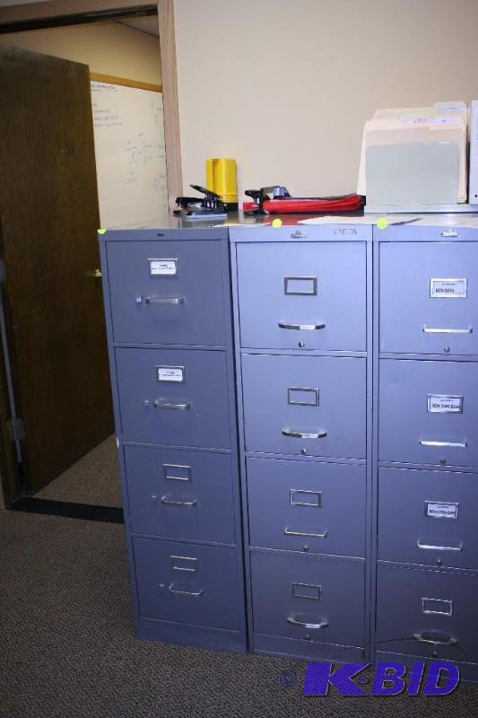 lot 104 image: Lot of (2) Metal Filing Cabinets, 15x28x52, Contents Not Included, Cabinets have 4 Drawers.