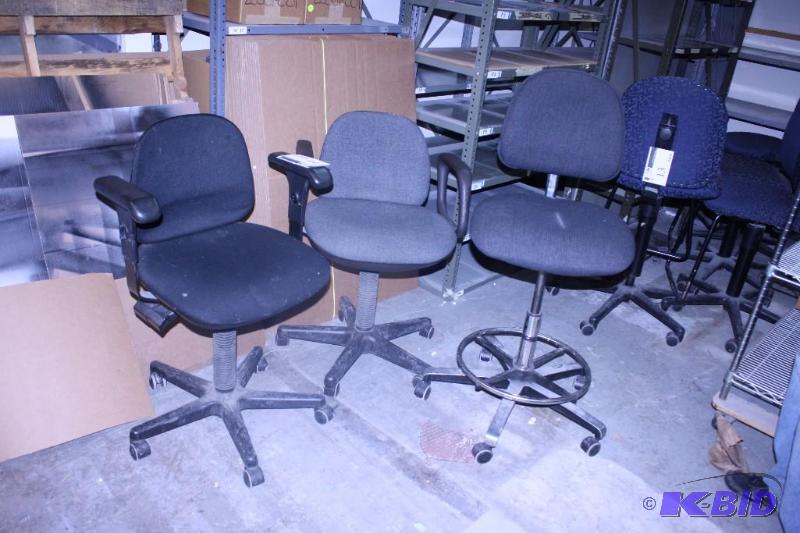 lot 14 image: Lot of (3) Chairs with Wheels (2) With Armrests and (1) With a Foot Bar.