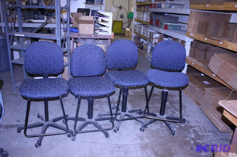 lot 16 image: Lot of (4) Blue Chairs with Wheels and Foot Bars.