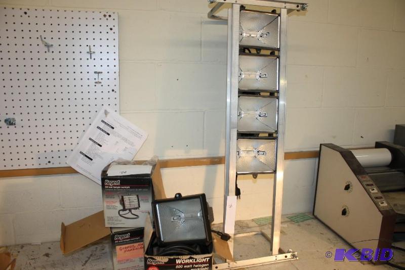 lot 26 image: Standing Tower of Work Lights, Glass and Guards in Boxes, 4 Pieces.