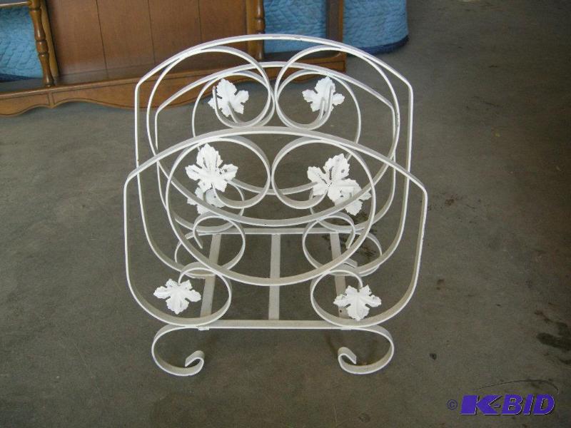 lot 152 image: Vintage iron magazine rack
