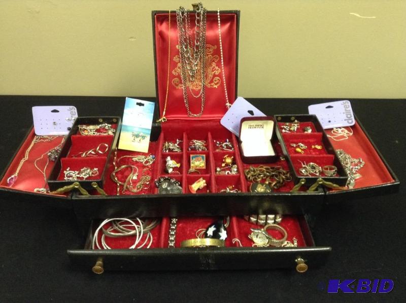 lot 47 image: Large lot of costume jewelry in  case