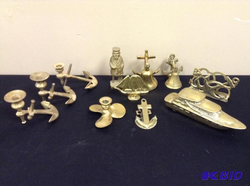 lot 18 image: Sea Themed Brass - Bells, Anchors, Boat & Captain Figures