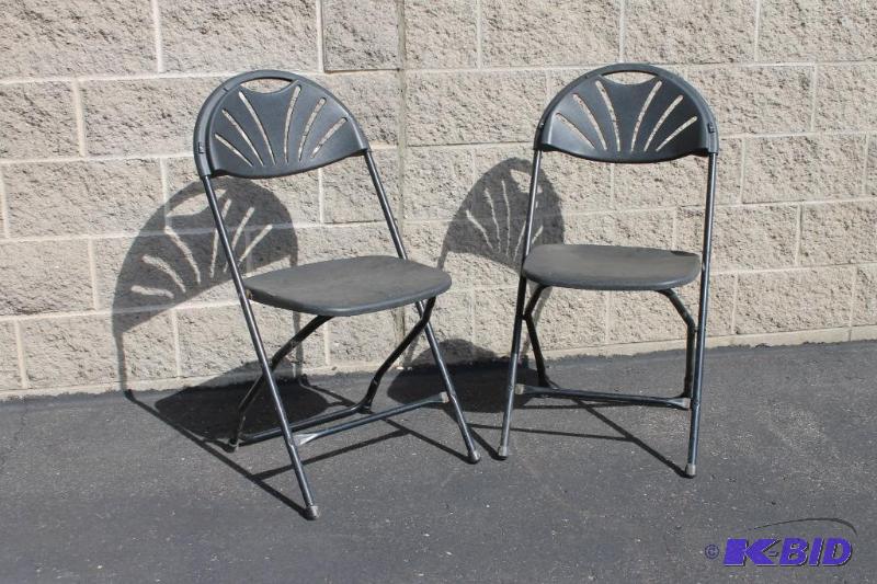 lot 42 image: Black Fan Back Chairs
