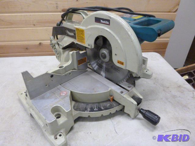 lot 11 image: Makita 12" Power Miter Saw Model LS1221 ...