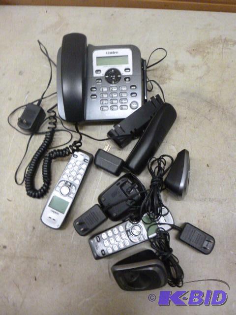 lot 28 image: Uniden Phone System 4 6.0 phones....