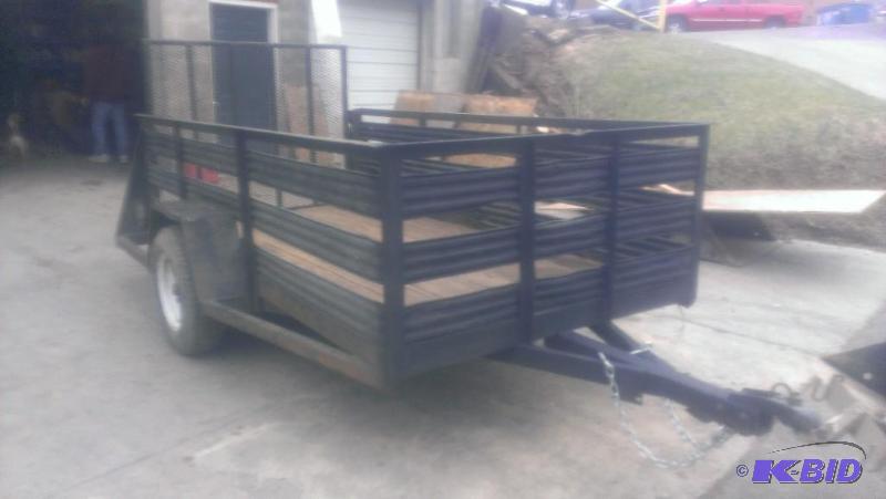 lot 1A image: 1999 Redi Haul Utility Trailer. Perm Reg ADJA-642, Stake Bed Sides, Wood Deck 5 x 10