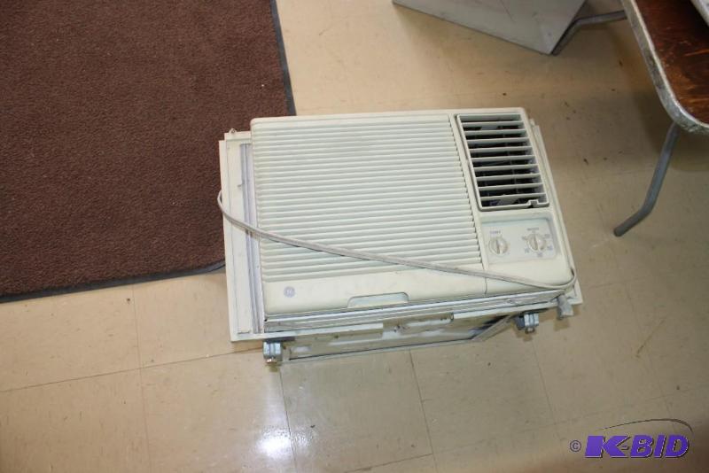 lot 64 image: GE AC Window Unit, Volts 115, Amps 7.8.