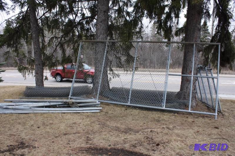 lot 76 image: Chain Link Lot of (22) Including (16) Poles (4) Rolls (1) Swing Gate and (1) Rolling Gate.