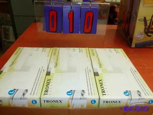 3 boxes large vinyl gloves. 100 per box. Ter...