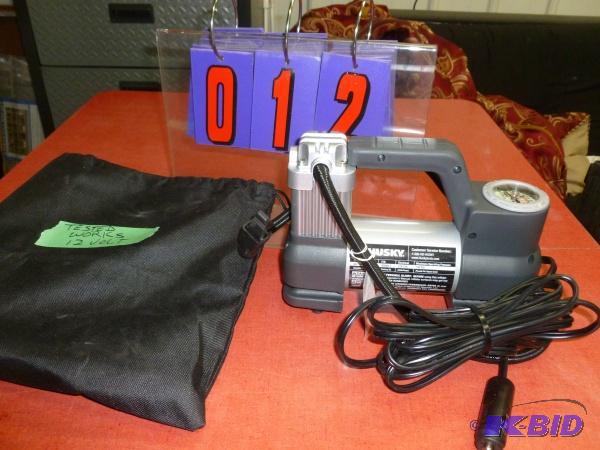 Husky 12 volt inflator. Tested and works. Ter...