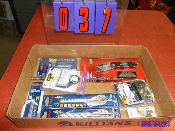 Flat of dremmel and bosch bits. As shown. Ter...
