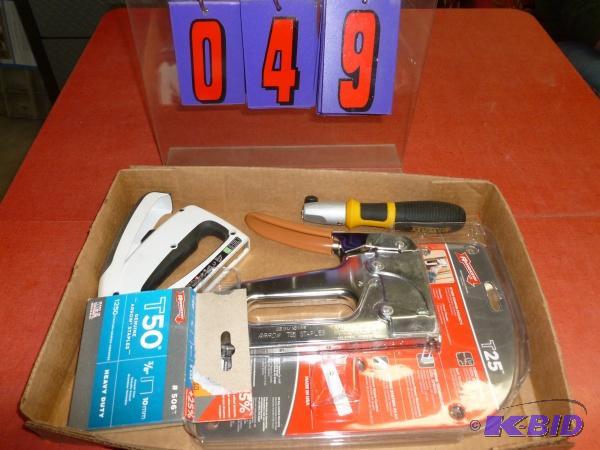 Flat with stapler and staples. As shown. Term...