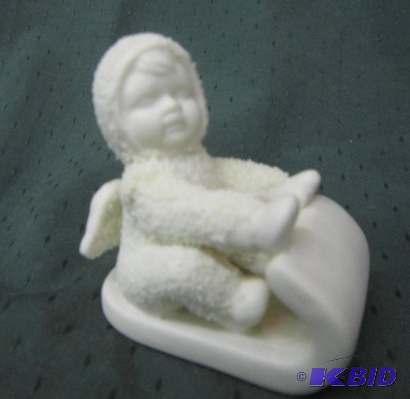 lot 205 image: COLLECTIBLE Snowbaby on Sled - Dept 56