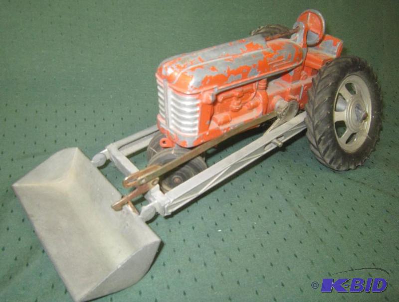 lot 209 image: COLLECTIBLE Hubley Tractor with Plow