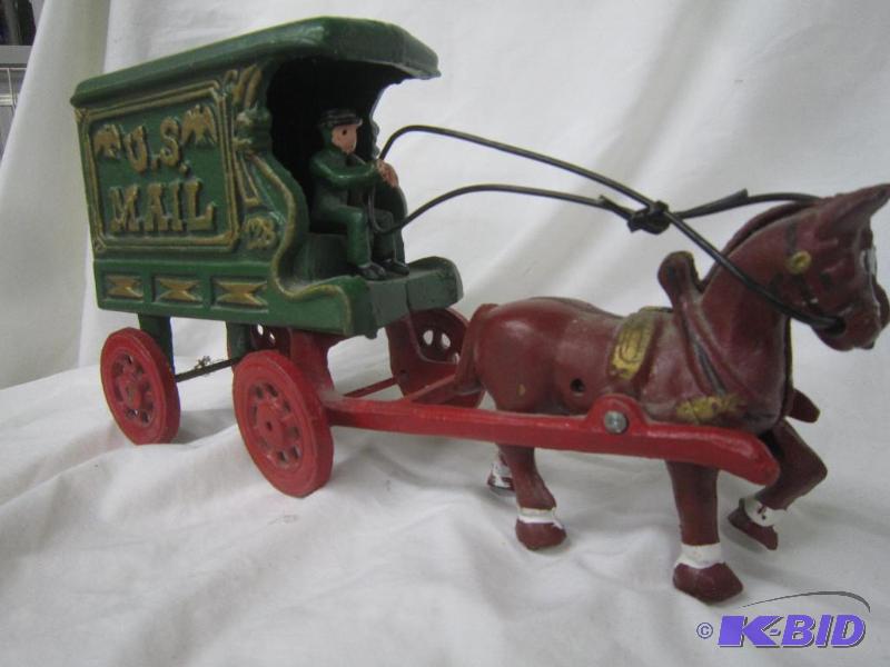 lot 214 image: COLLECTIBLE US Mail Carrier Cast Iron