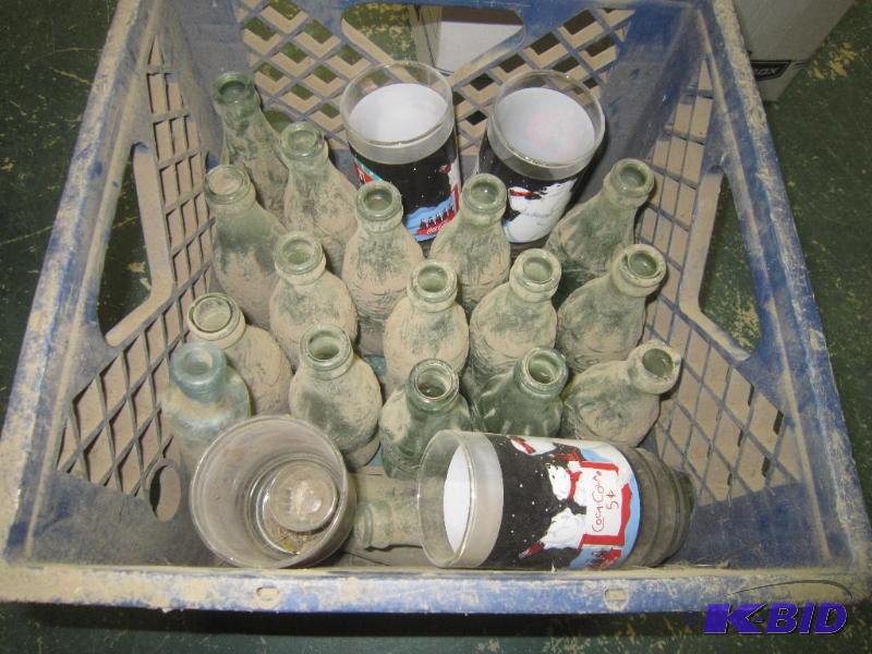 lot 253 image: COLLECTIBLE - 18 Coke Bottles 4 Coke Glass and Crate