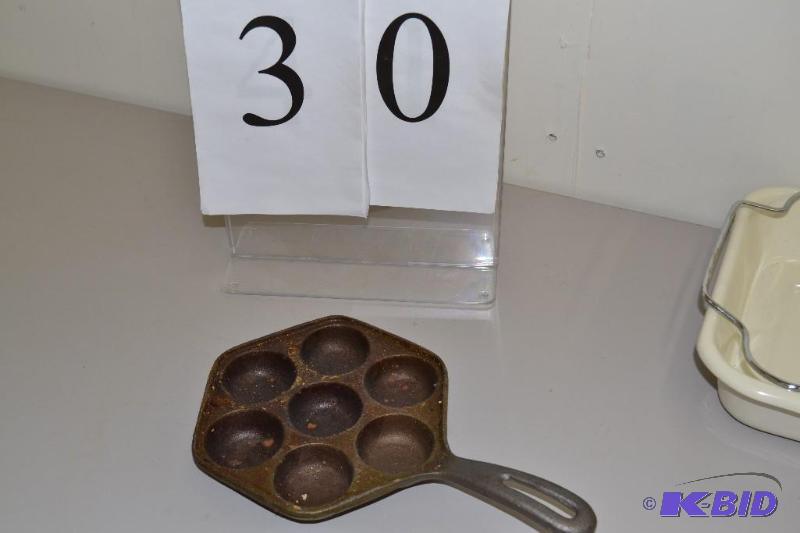 lot 30 image: cast iron egg poacher