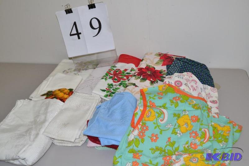 lot 49 image: Table cloths, napkins, aprons