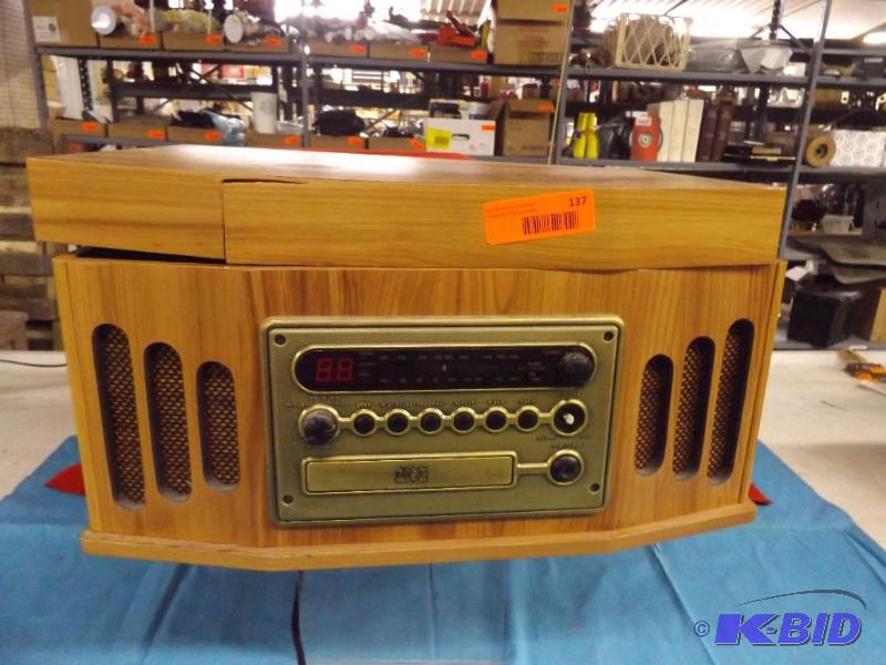 Record player, cd player. Has damage...