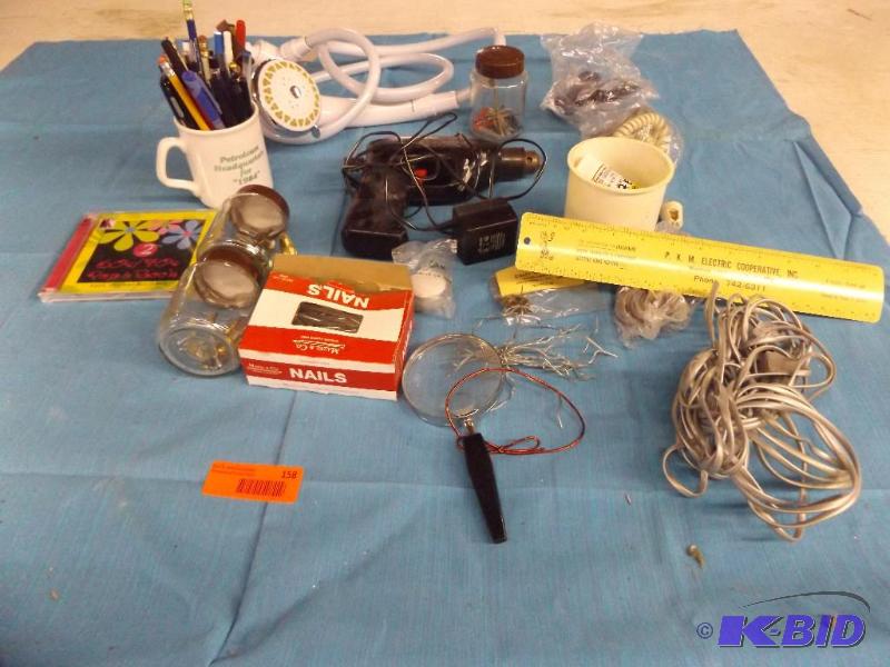 lot of misc items, magnifying glass, shower h...