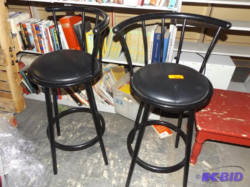 pair of swivel stools, metal frames and padde...