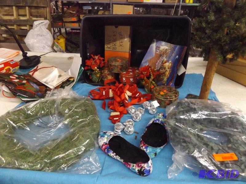 storage tote with contents, wreaths, tin cans...