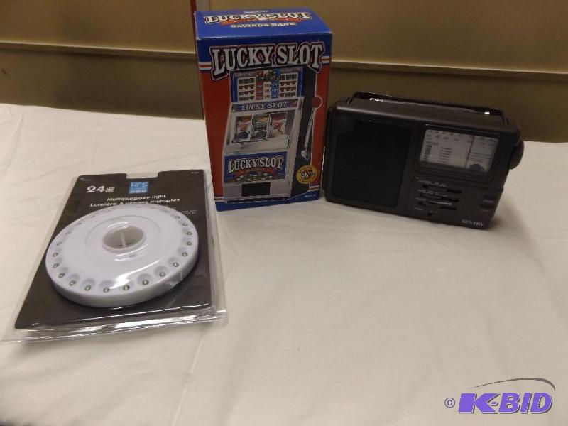 lot 182 image: Slot Machine bank, LED Light, Sentry AMFM Ra...