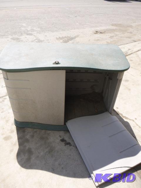 Patio Storage Unit One door needs repair....