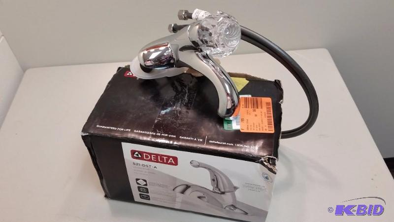 Delta Classic 4 in. 1-Handle Bathroom Faucet in Chrome.  Damaged Box.  All there.