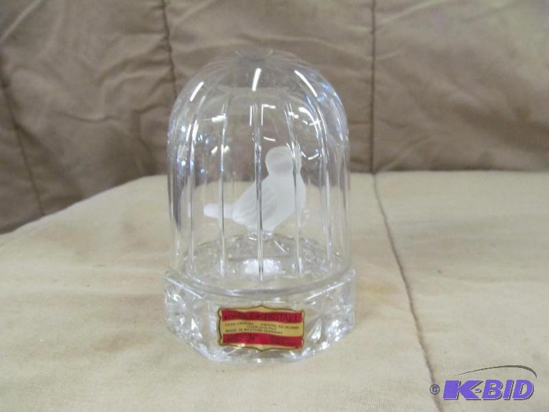Bird in glass cage