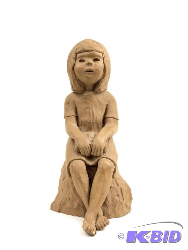 lot 22 image: vintage clay statue of a girl sitting dated 1973
