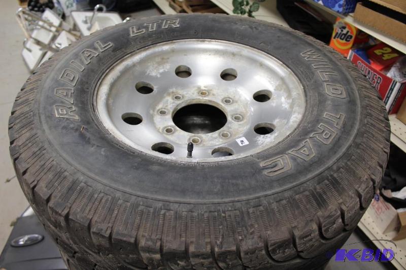 lot 76 image: LT26575R16 Tires on 8 Bolt Aluminum Wheels