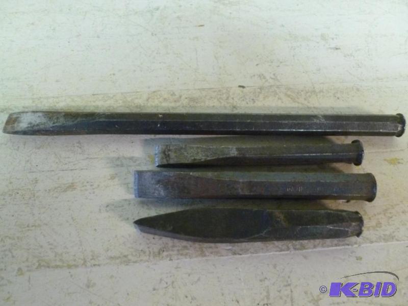 Lot of four heavy duty steel chisels that inc...