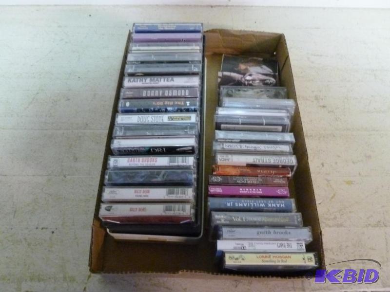 Large lot of 32 cassette music tapes, comes w...