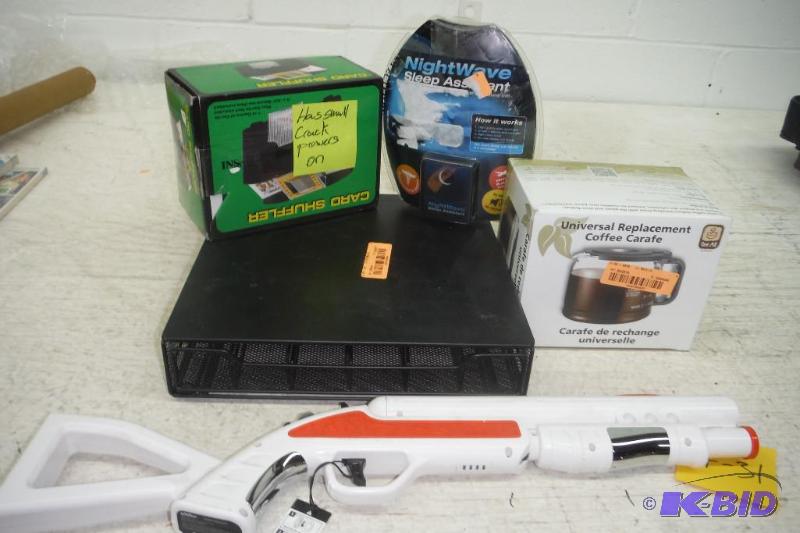 lot 32 image: Lot of misc. items including keurig coffee pod holder, coffee pot replacement, card shuffler, sleep machine aid etc., see picture.