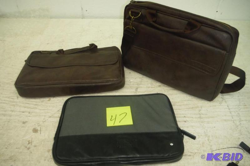 lot 47 image: Set of 2 leather eddie bauer laptop bags and a black laptop carrier.