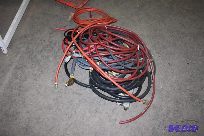 lot 104 image: Lot of (12) Miscellaneous Size & Length Air Hose wMiscellaneous Connector Ends And More.
