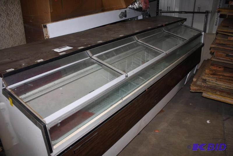 lot 8 image: Regrigerated CoolerCold Case wDisplay Racks & Sliding Glass Windows May Require Tools To Remove.
