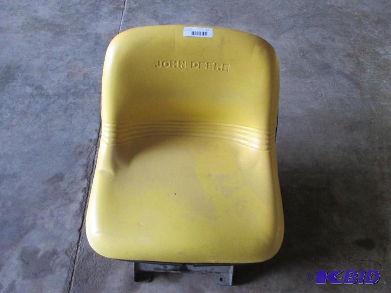 lot 15 image: John Deere tractor seat, very good condition....